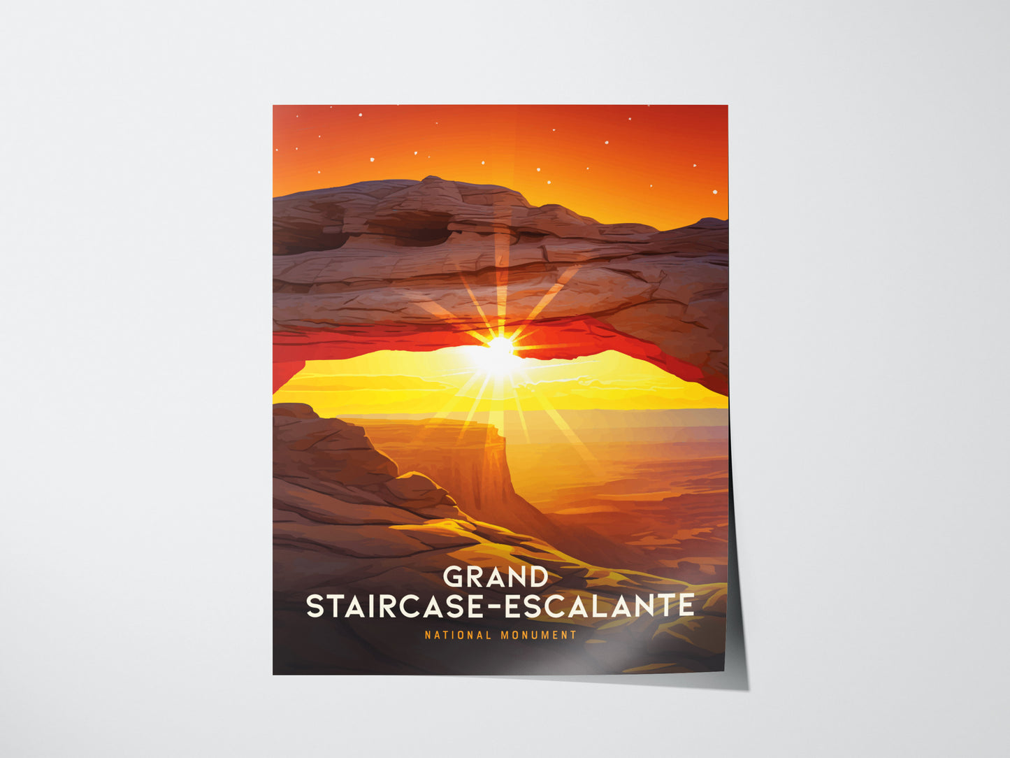 Illustrated poster of Grand Staircase–Escalante National Monument featuring a vibrant sunset through a natural rock arch, with stars in the twilight sky. Text reads Grand Staircase–Escalante National Monument.