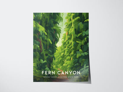 A poster of Fern Canyon features lush green ferns cascading down steep canyon walls, with Fern Canyon, Prairie Creek Redwoods State Park written at the bottom.