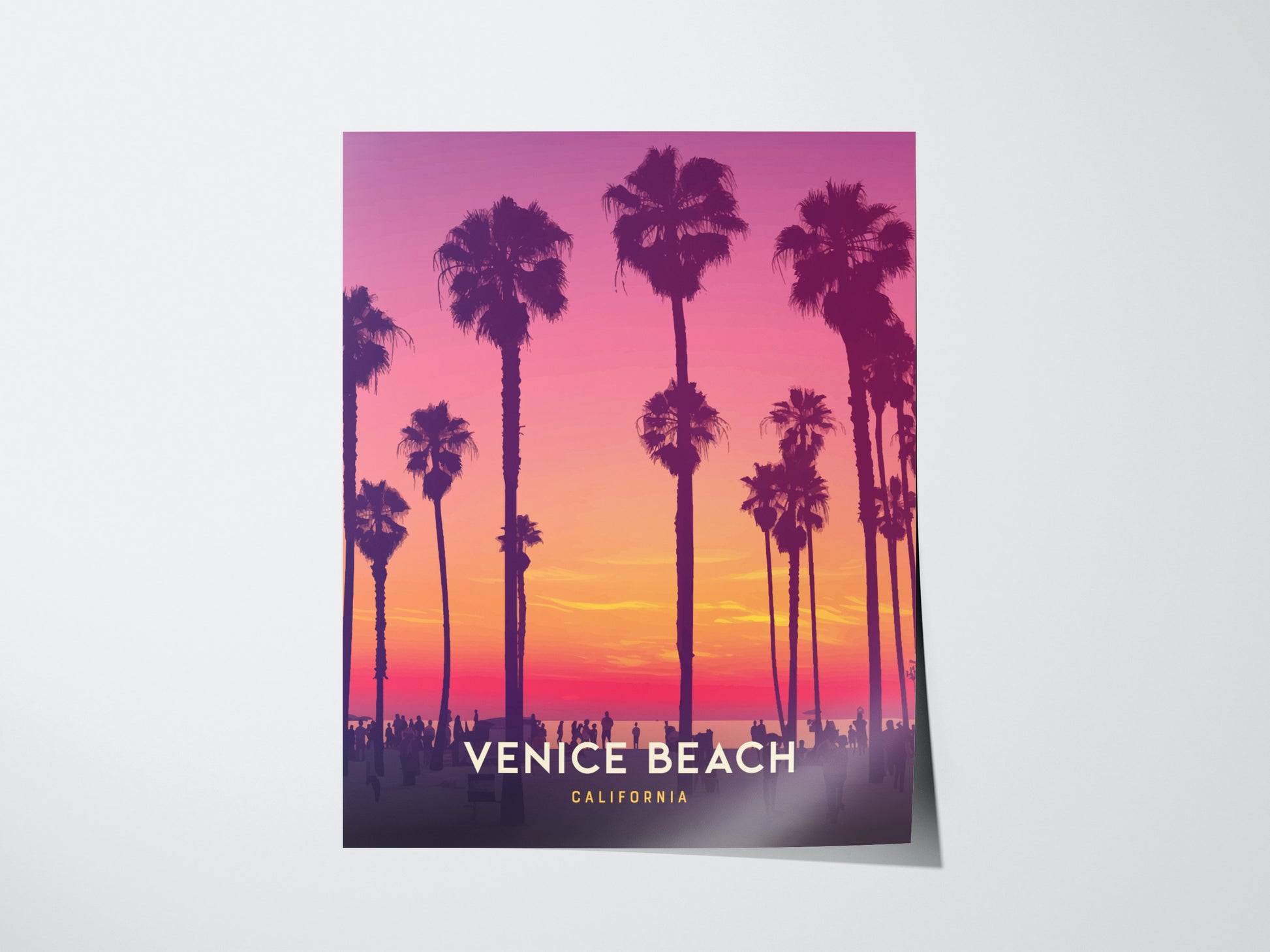 Venice Beach poster featuring tall palm trees silhouetted against a vibrant pink and orange sunset sky. The words Venice Beach California are displayed at the bottom.