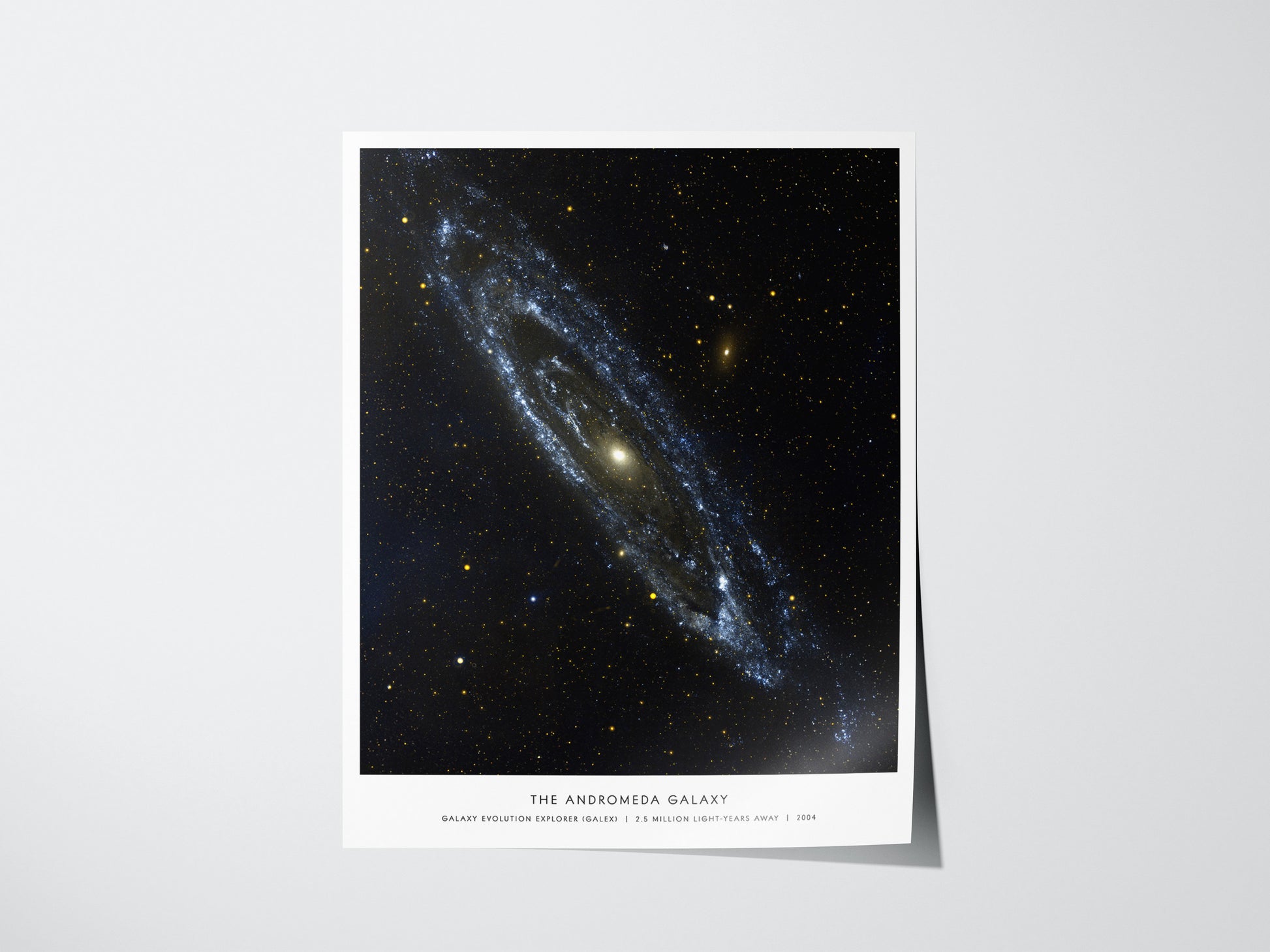 Andromeda Galaxy poster featuring NASA-inspired view of spiral galaxy Messier 31 with bright core and sweeping arms