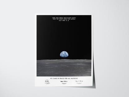 Apollo 11 Earth on the Horizon poster showing Earth rising above the Moon’s surface with plaque text overlay