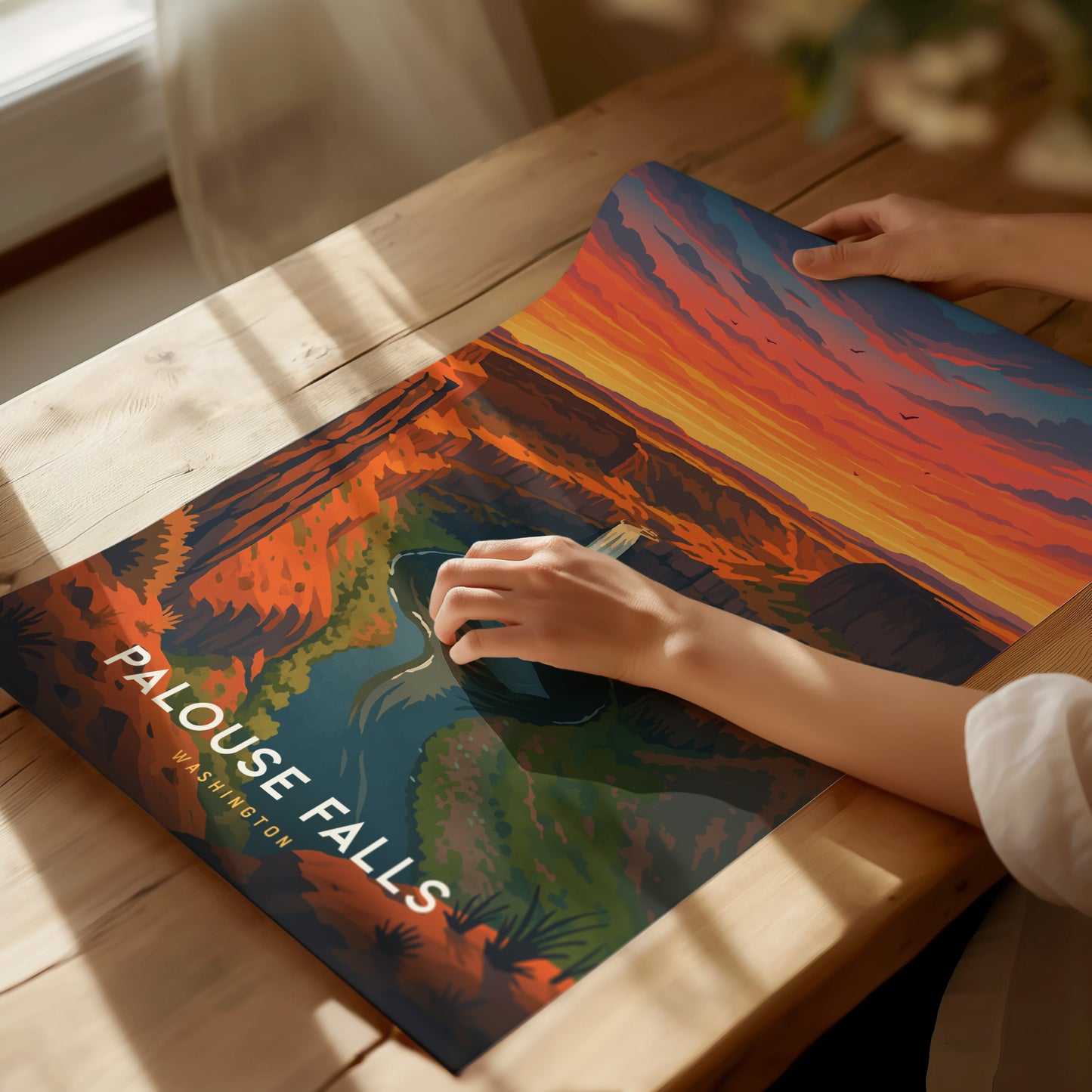 Framed vintage poster of Palouse Falls at sunset, showcasing warm hues and stylized canyon landscape in travel art design.