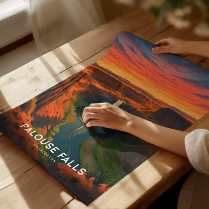 Framed vintage poster of Palouse Falls at sunset, showcasing warm hues and stylized canyon landscape in travel art design.