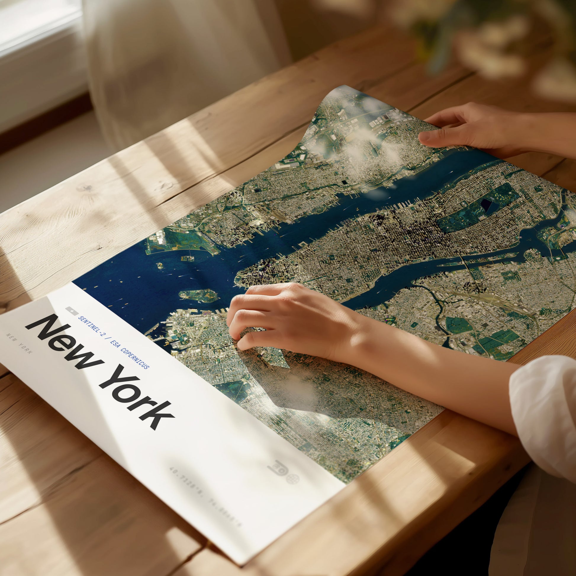 Framed aerial satellite print of New York City, showcasing detailed urban landscape in subdued colors, perfect travel art for decor.
