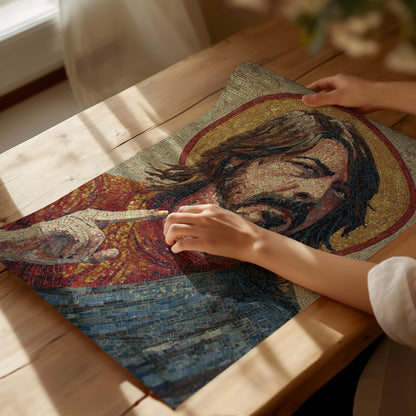 A person gently touches a vibrant mosaic artwork depicting a bearded figure with long hair, set against a rich background of red and blue tiles.