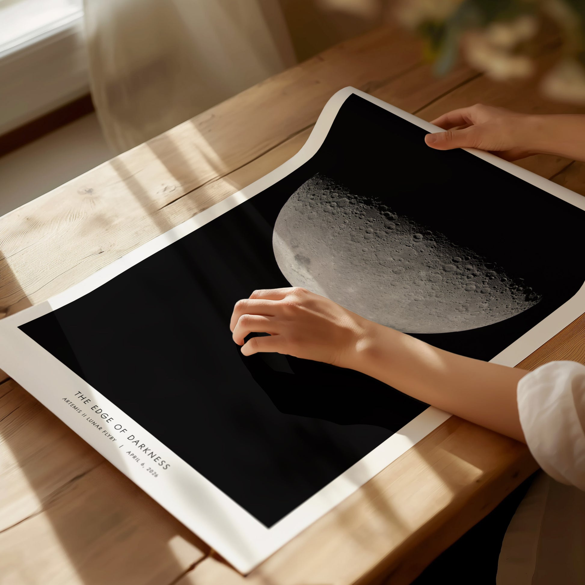 High-resolution lunar craters and textures in grayscale, showcasing the moon's beauty from the Artemis II NASA mission.