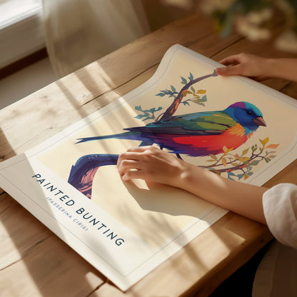 Stylized Painted Bunting art print with vibrant blue, green, red, and orange feathers, framed in sleek black for colorful bird wall decor.