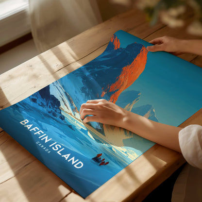 Framed Baffin Island wall art print featuring a vibrant mountain landscape at sunrise, with deep blues and bright oranges, showcasing adventure and travel art.
