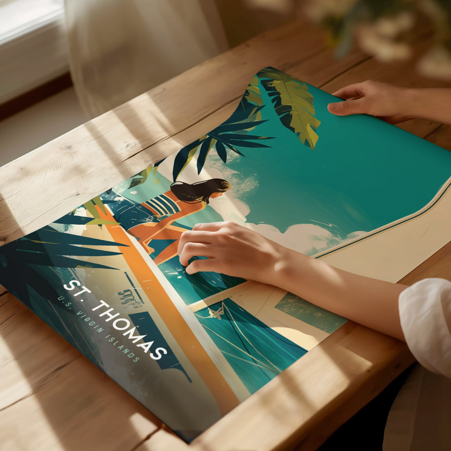 A person handling a colorful poster featuring a woman on a boat in turquoise waters, with palm leaves and St. Thomas U.S. Virgin Islands text.