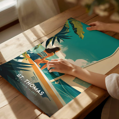 A person handling a colorful poster featuring a woman on a boat in turquoise waters, with palm leaves and St. Thomas U.S. Virgin Islands text.
