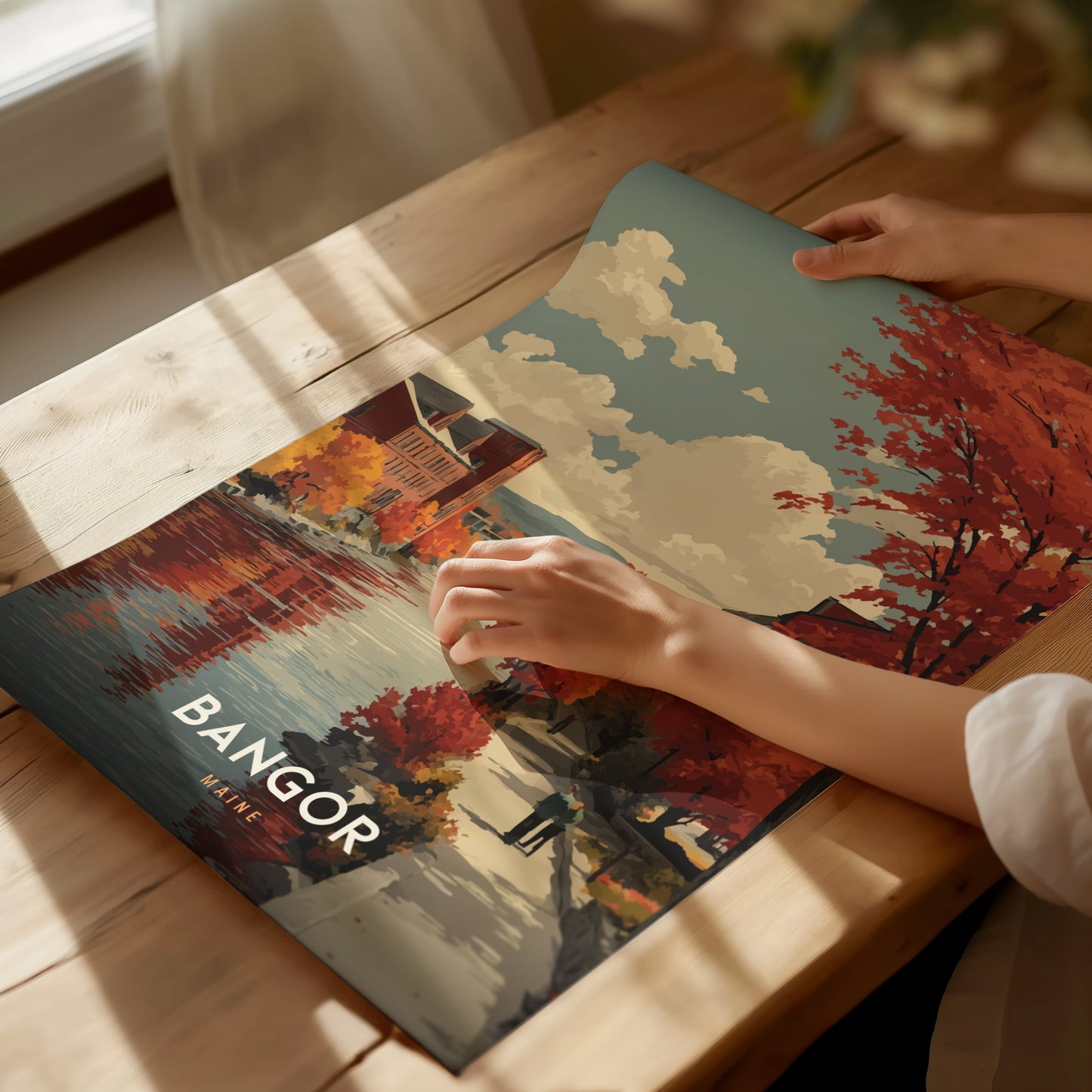 Framed Bangor Maine art print featuring a vibrant autumn river scene, with colorful trees, historic buildings, and a couple walking along the water.