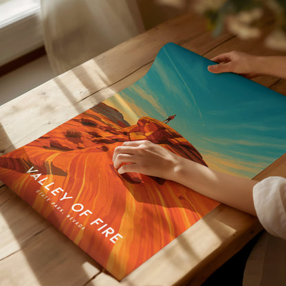 Stylized illustration of Valley of Fire, Nevada, featuring a person on a vibrant rock formation under a deep blue sky.
