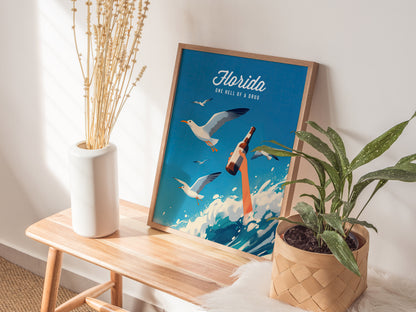 A poster titled Florida - One Hell Of A Drug features seagulls and a hand holding a bottle over ocean waves. Its displayed on a wooden bench with plants and.