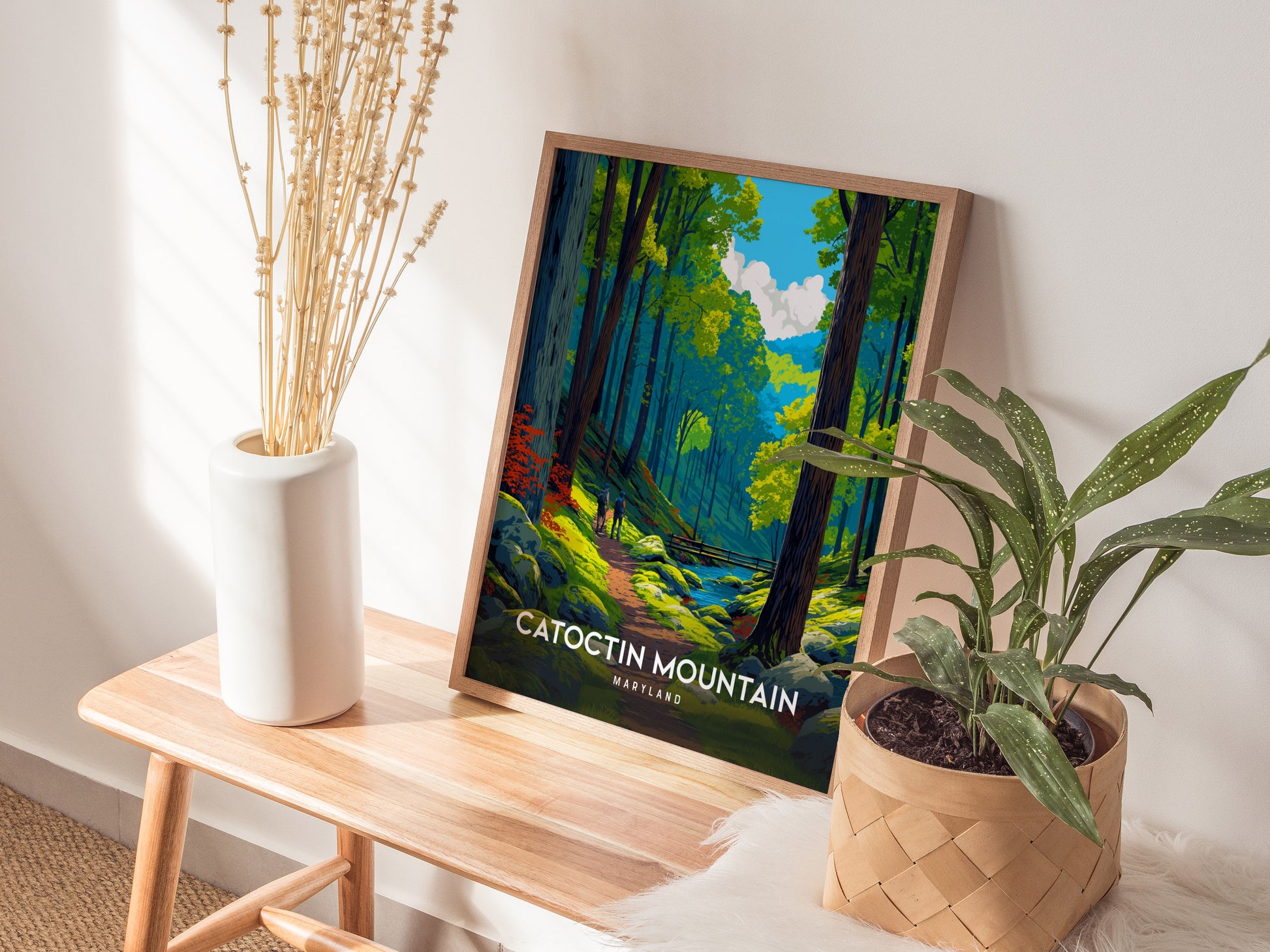Framed Catoctin Mountain Maryland poster featuring a vibrant forest path, lush greenery, and two figures exploring the tranquil landscape.