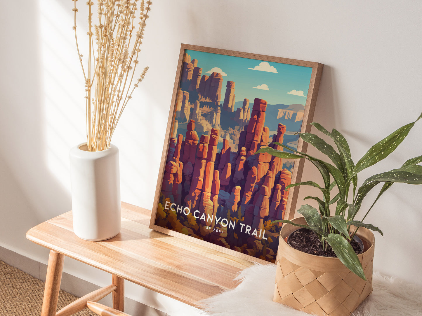 Stylized Echo Canyon Trail wall art features vibrant reds, oranges, and purples of Arizona's rock formations under a blue sky.