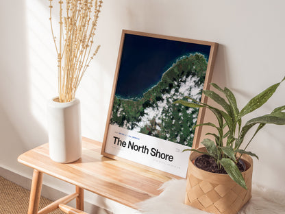 Framed Oahu North Shore satellite coastal print showcasing deep blue ocean, lush green land, and white clouds, perfect for travel art decor.