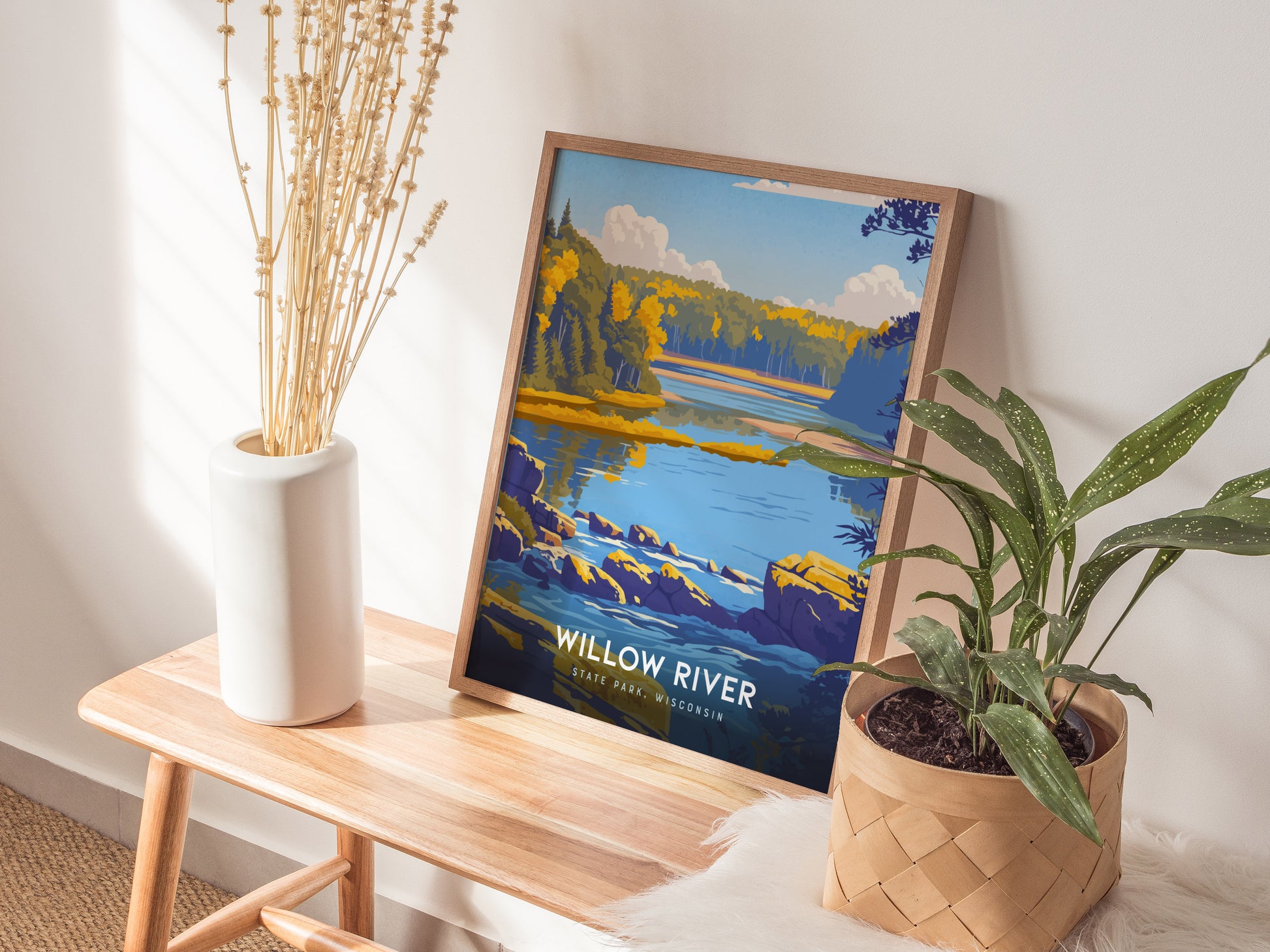 Framed Willow River Wisconsin poster featuring a serene autumn landscape with a calm river, vibrant trees, and a blue sky.