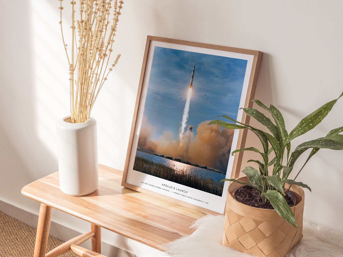 Apollo 8 Saturn V launch wall art used as space themed decor in a study or library