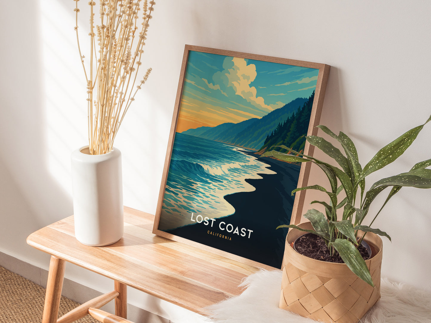 Vintage coastal art print showcasing the vibrant Lost Coast California, featuring lush cliffs, dark sandy beach, and tranquil waves.