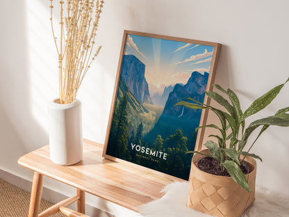 Framed Yosemite print on a wooden table with plants and a vase.