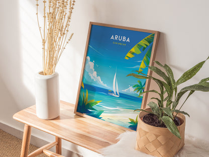 A framed Aruba travel poster featuring a sailboat on turquoise waters is displayed on a wooden bench alongside a plant in a woven basket and a white vase with dried.