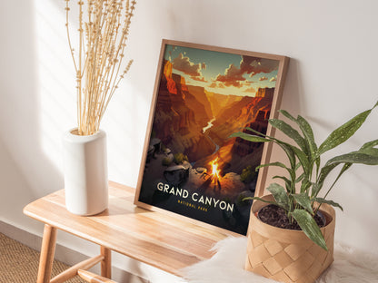 A framed Grand Canyon poster is displayed on a wooden bench beside a white vase with dried flowers and a potted green plant.