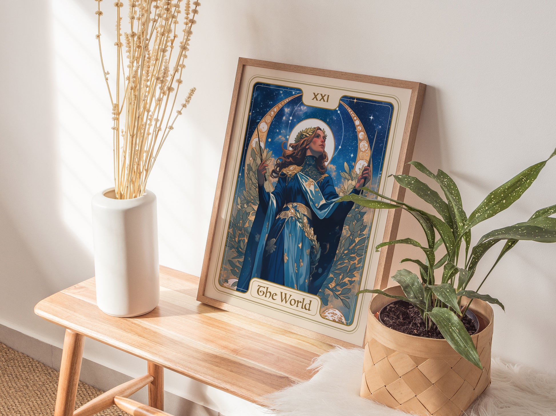 Home setting displaying framed and unframed wall art posters of a crowned figure amidst stars and laurel leaves.