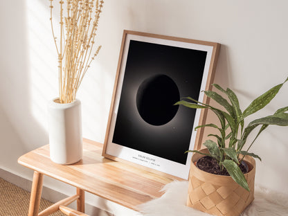 Solar eclipse wall art featuring a detailed, realistic depiction of the moon obscuring the sun, with a bright halo effect.