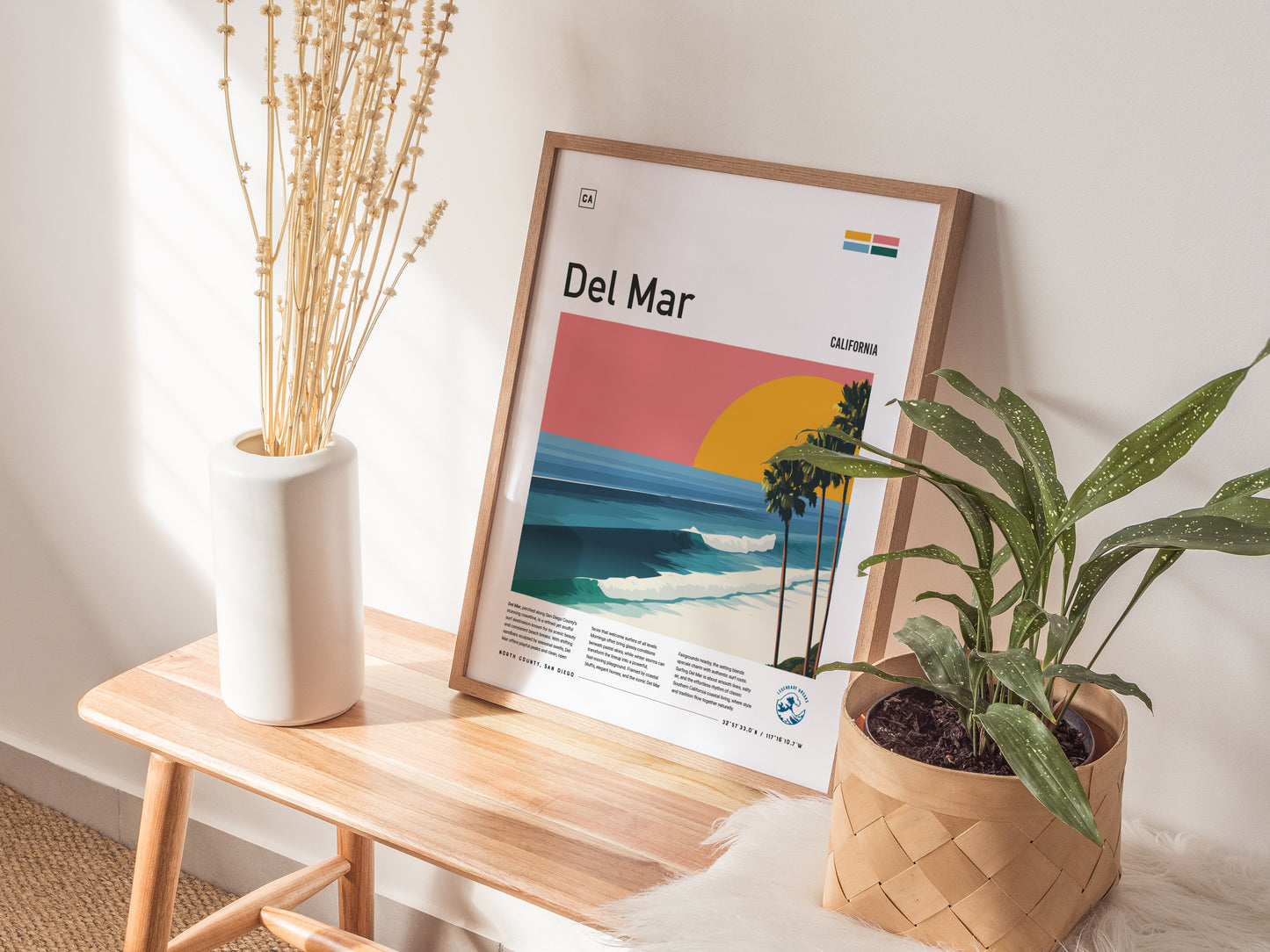 Framed Del Mar Beach poster featuring a vibrant California sunset with palm trees, waves, and a warm pink sky, perfect surf decor.