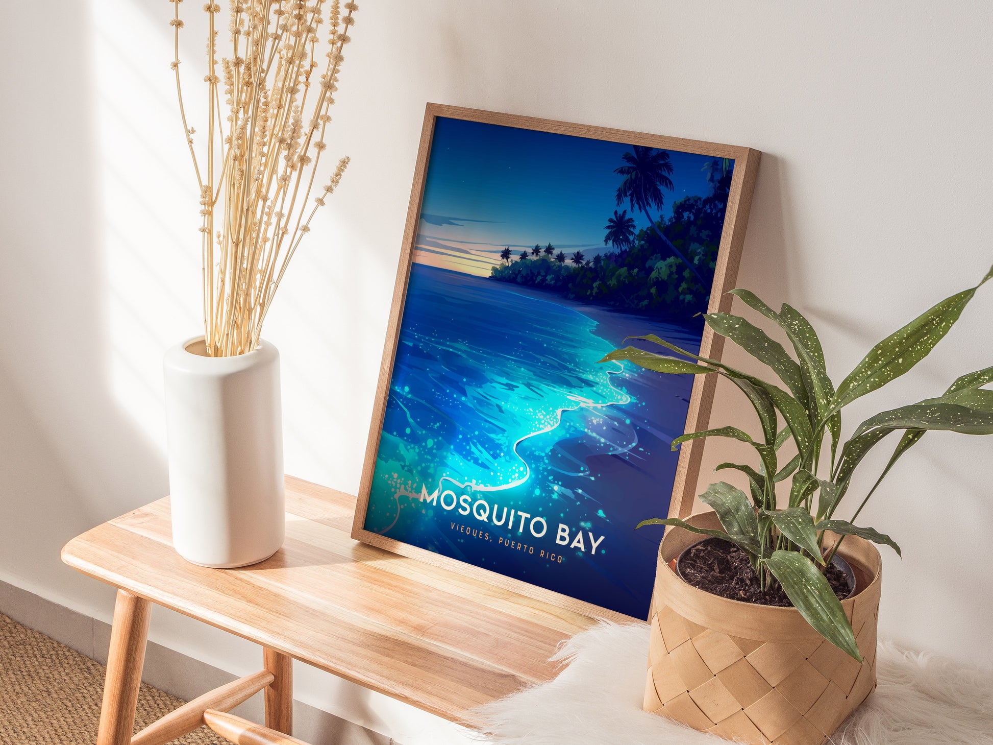 Framed Mosquito Bay poster featuring glowing blue bioluminescence, palm trees, and a twilight sky, perfect travel art print.