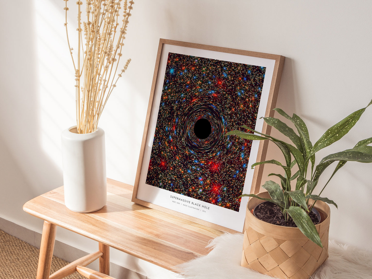Supermassive Black Hole Poster | NASA NGC 1600 Space Photography Wall Art — styled in a modern interior