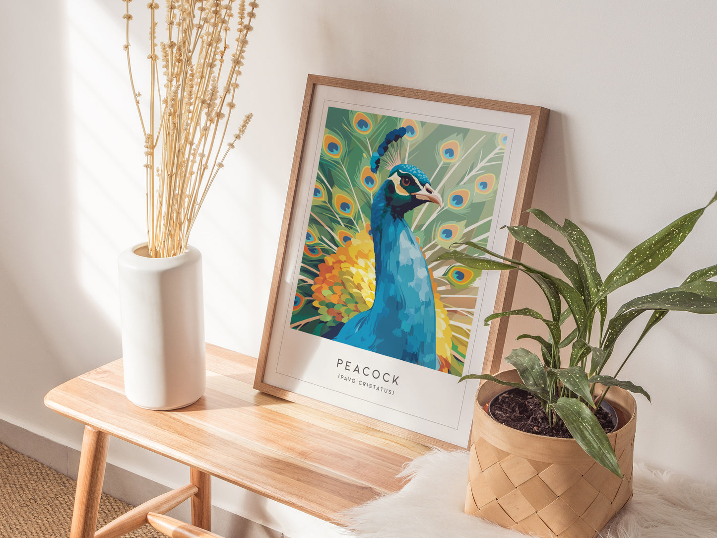 Vibrant peacock art print with fanned tail feathers in blue, green, and yellow; bold graphic style perfect for wildlife art decor.
