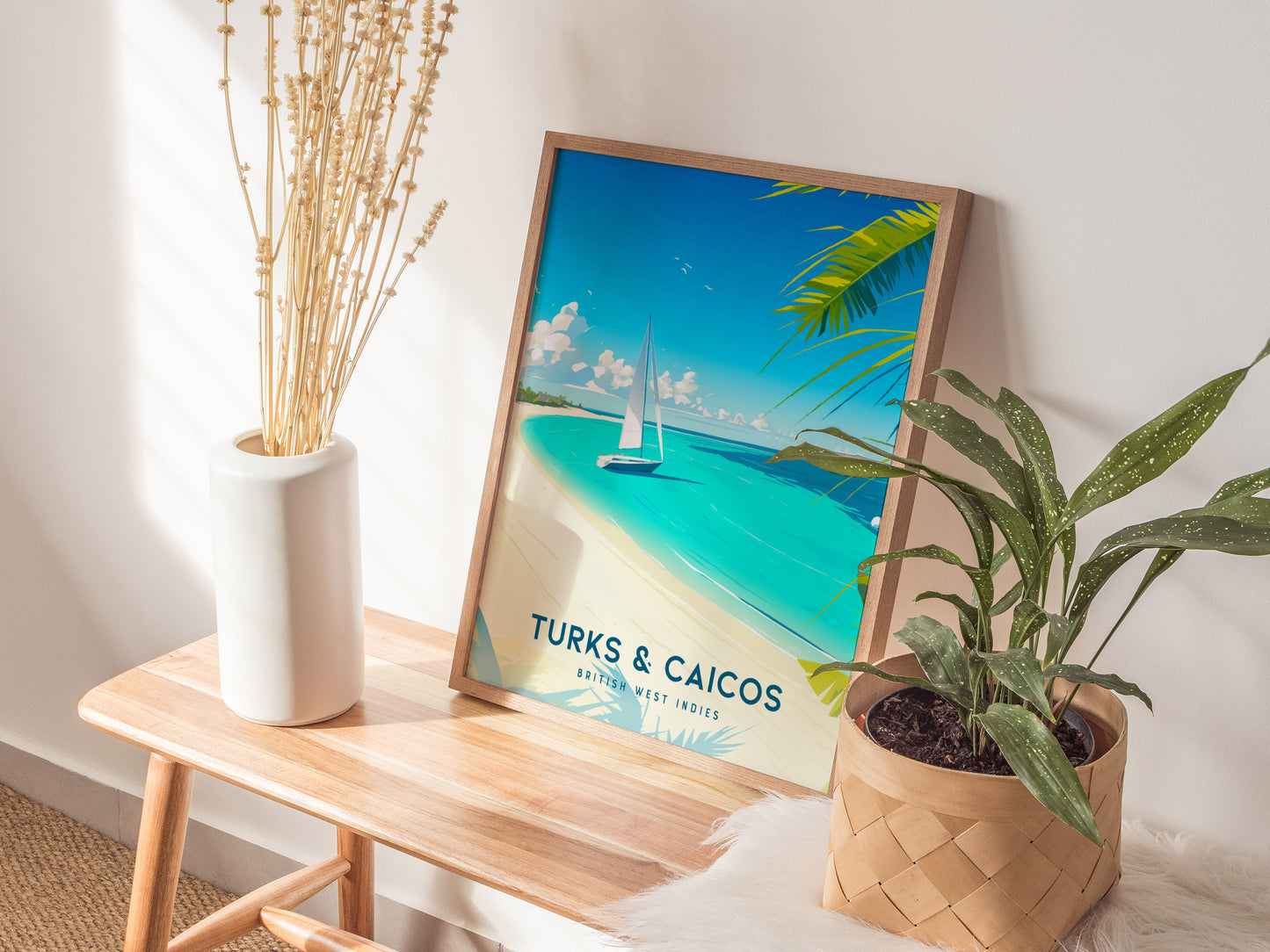 Vibrant Turks & Caicos beach poster featuring a sailboat on turquoise waters, framed by palm fronds and a sunny sandy beach.