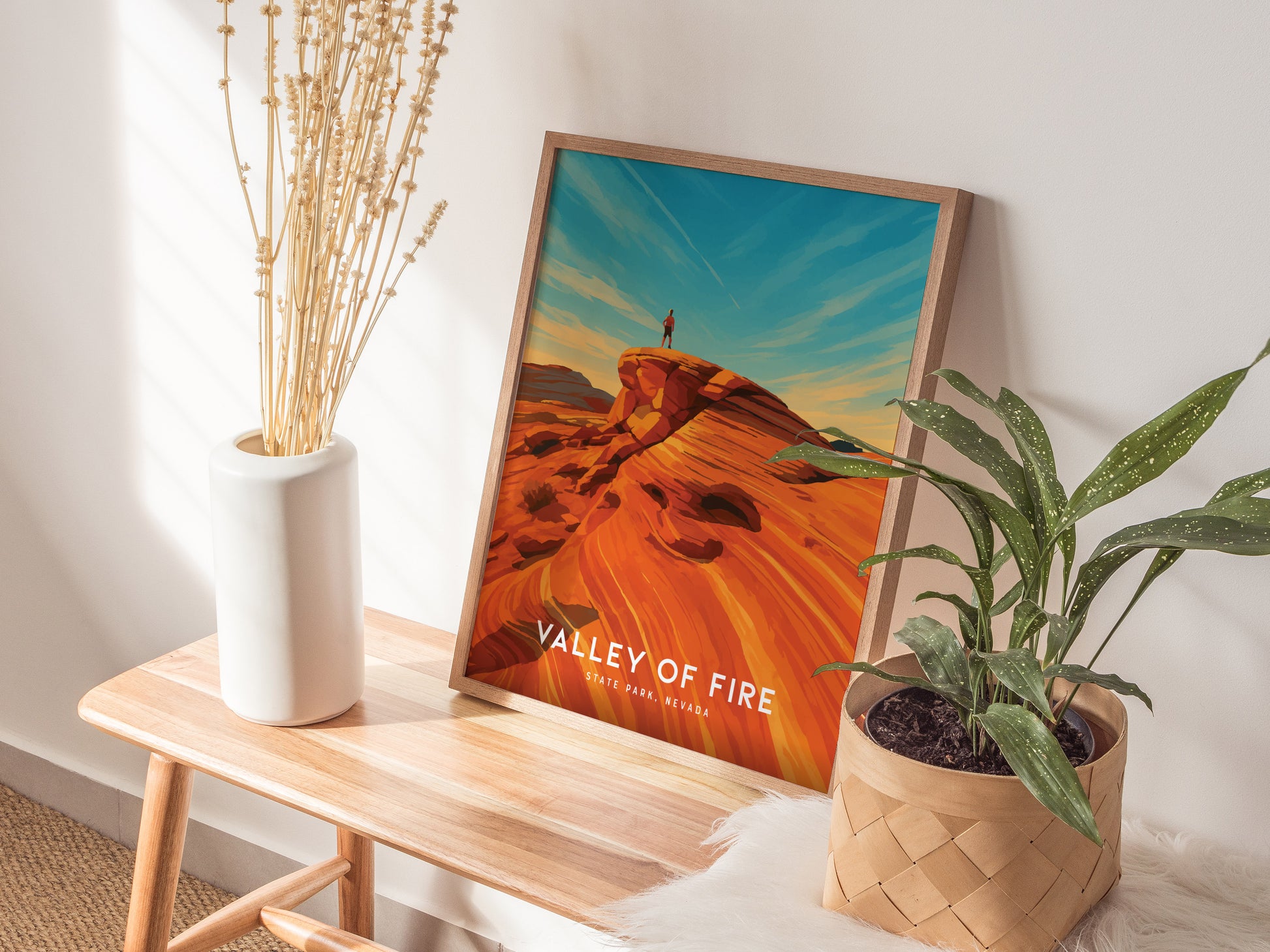 Stylized illustration of Valley of Fire, featuring a traveler on red rocks under a vibrant sunset sky, perfect travel art.