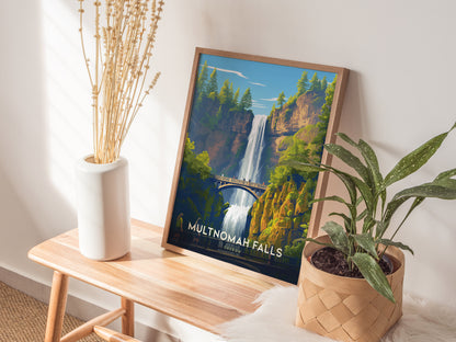 A framed Multnomah Falls poster leans against a wall on a wooden bench, accompanied by a white vase with dried flowers and a potted plant.