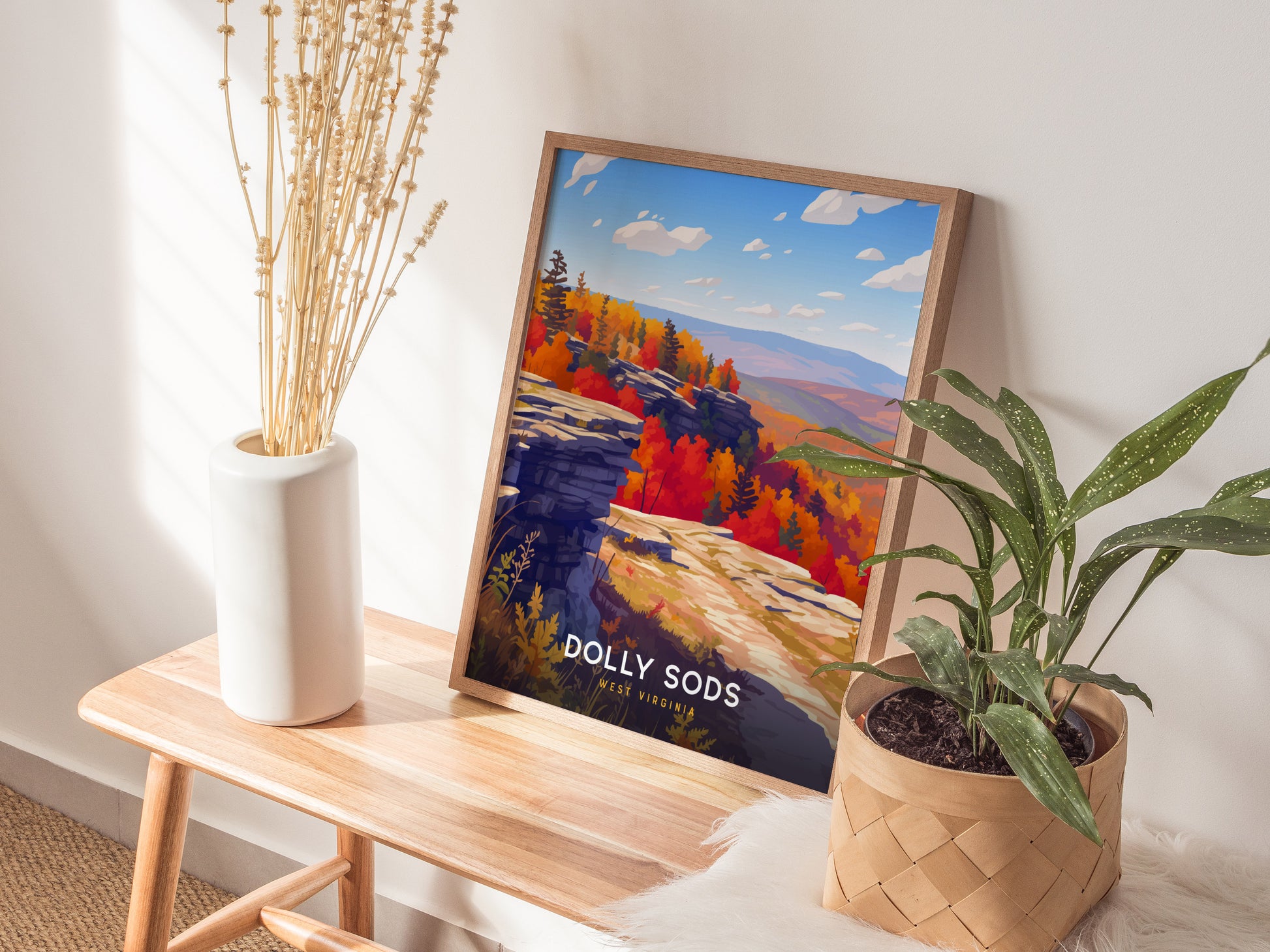 Vibrant autumn landscape of Dolly Sods, featuring rich orange and red foliage, rocky outcrops, and a bright blue sky, perfect travel art.