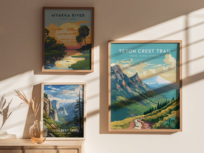 Three framed posters are displayed on a wall, featuring Myakka River, Teton Crest Trail, and Clouds Rest Trail, each depicting scenic landscapes with mountains, rivers, and vibrant skies.