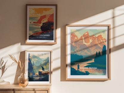 Three framed minimalist posters hang on a wall, depicting national parks: Hawaii Volcanoes, Great Smoky Mountains, and Grand Teton, with sunlight casting shadows across the scene.