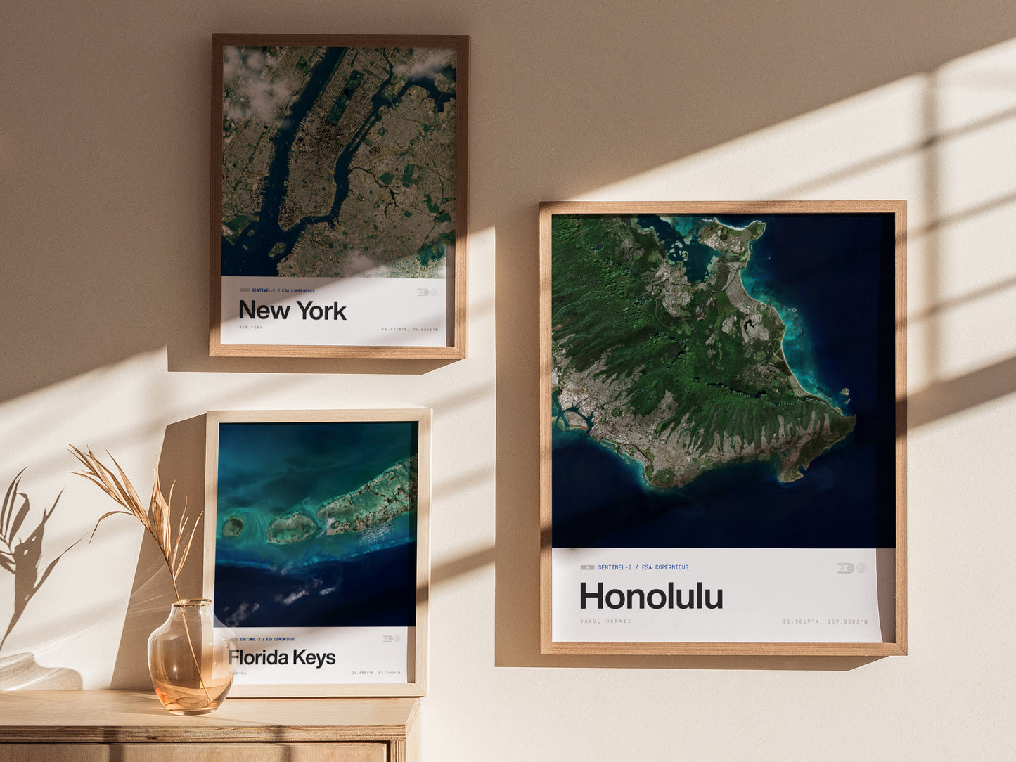 Aerial view of Honolulu, Hawaii, showcasing lush greens, blue ocean, and urban areas in a modern framed travel art poster.