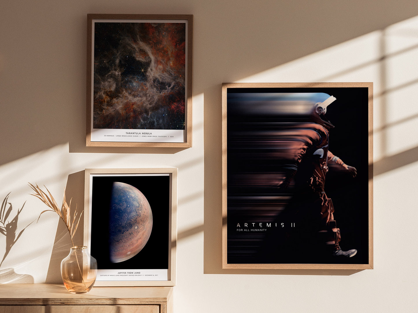 Gallery wall featuring the Artemis II poster paired with other NASA and Moon mission prints
