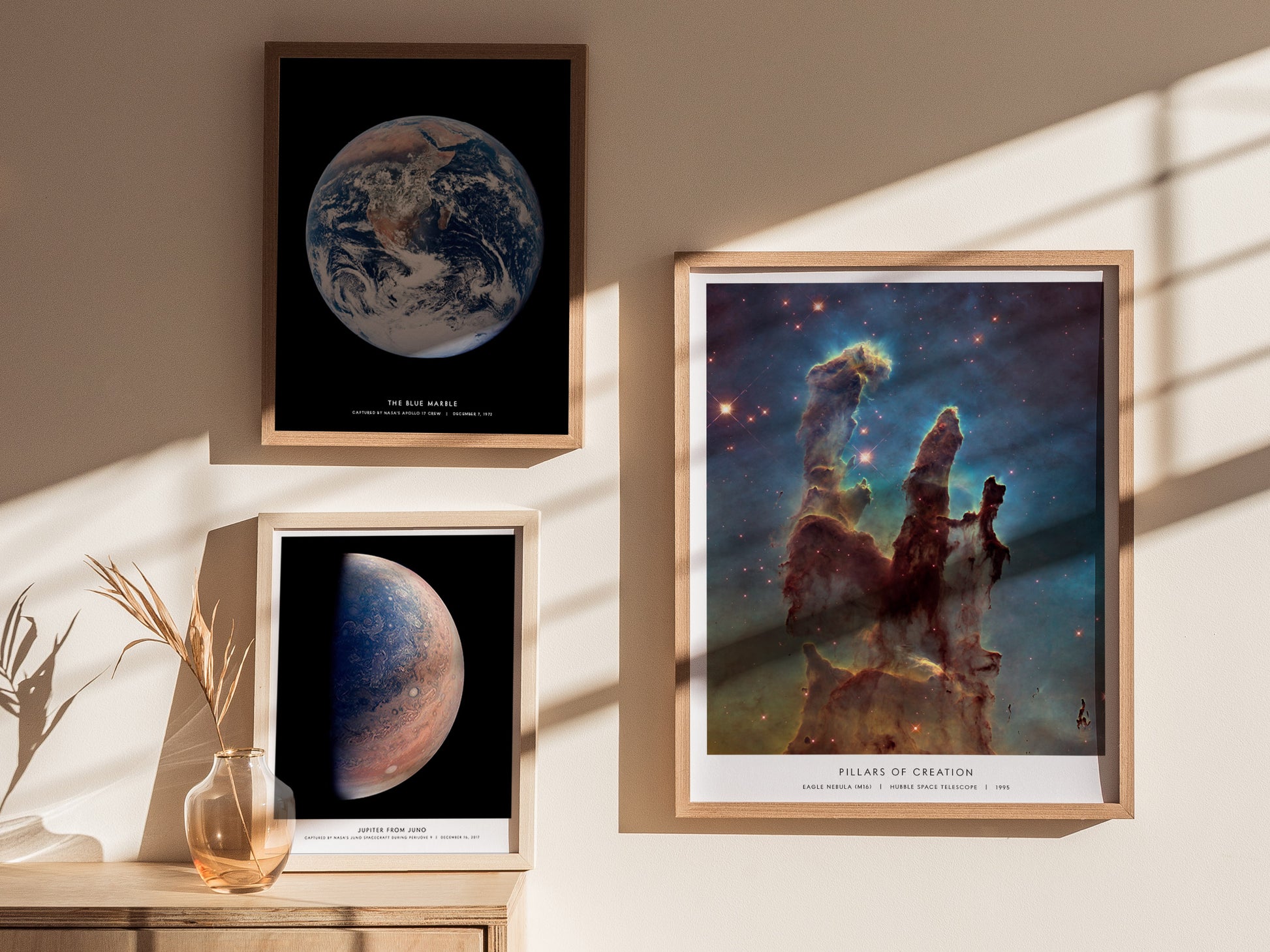 Gallery wall featuring Pillars of Creation poster alongside other NASA space prints