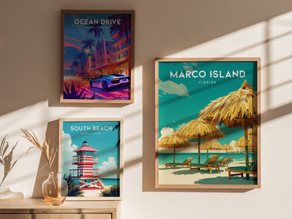 Three framed posters on a sunlit wall feature vibrant coastal scenes of Ocean Drive, South Beach, and Marco Island, highlighting palm trees, beach chairs, and a lifeguard tower.