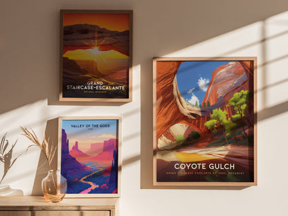 Three framed posters are displayed on a wall, featuring colorful landscapes of Coyote Gulch, Grand Staircase-Escalante, and Valley of the Gods, with natural light casting shadows.