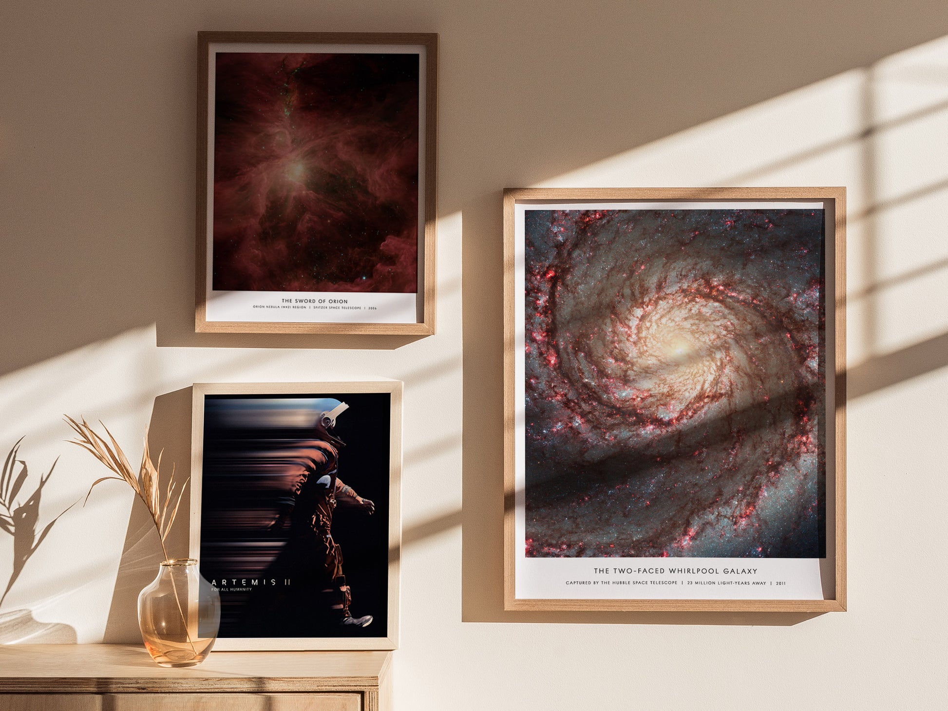 Gallery wall featuring the Whirlpool Galaxy poster paired with other NASA deep space prints