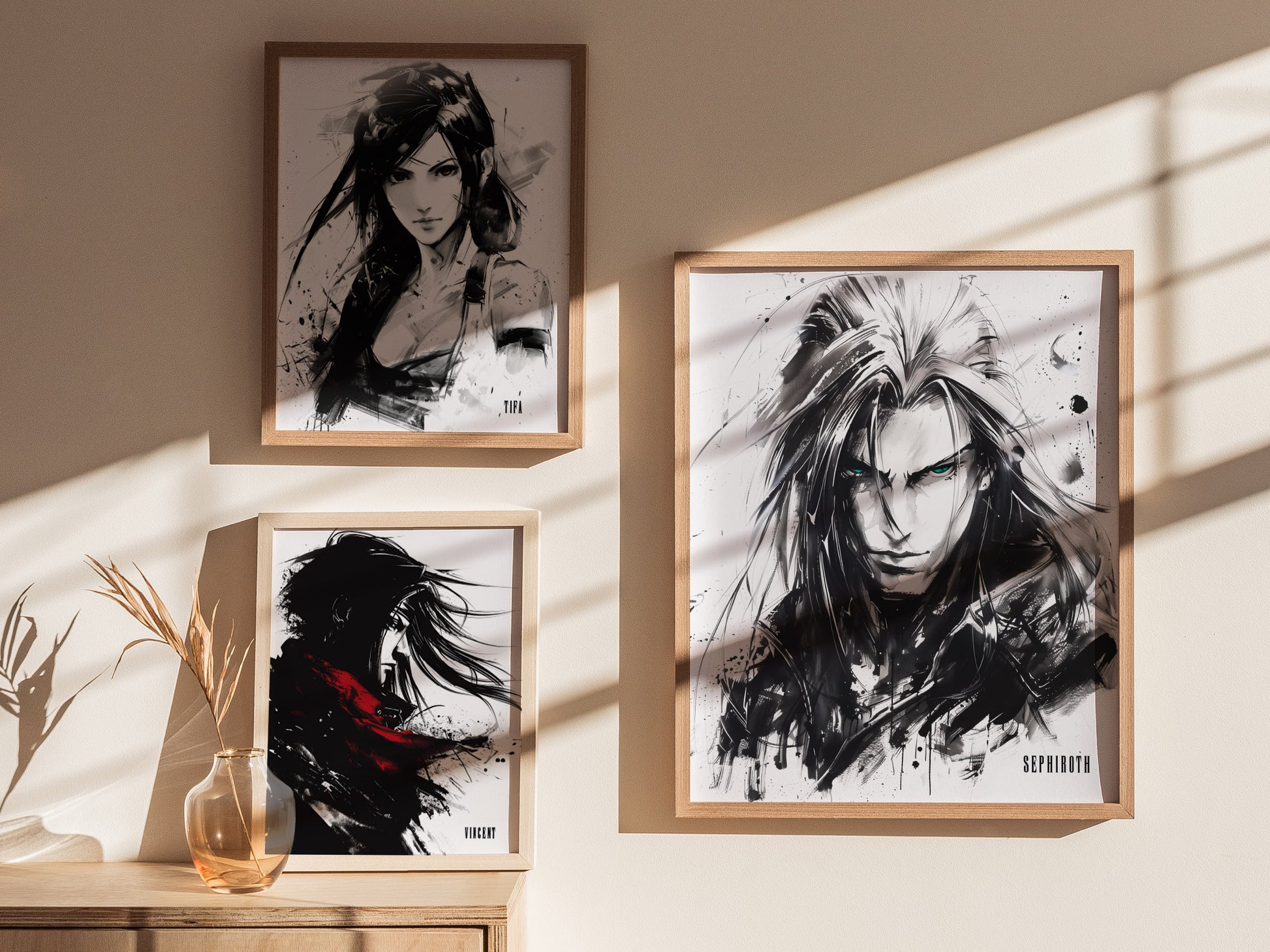 Three framed black and white posters are displayed on a wall, featuring dramatic illustrations of characters, with one highlighted by a vivid red accent. Sunlight casts soft shadows.