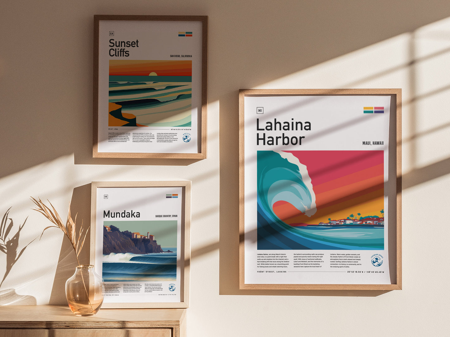 Framed Lahaina Harbor poster features a vibrant wave in bold blues, with a colorful sunset sky and minimalist surf art design.