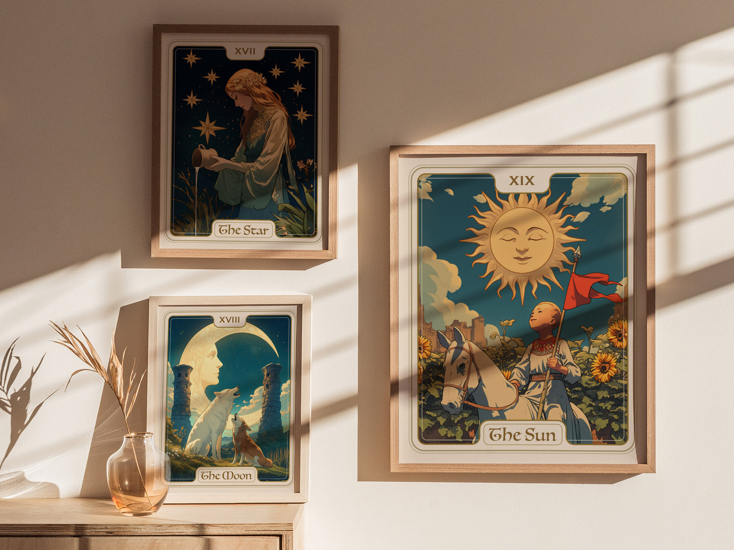 Three framed tarot card posters on a wall include The Star, The Moon, and The Sun, each with vibrant, detailed illustrations and warm sunlight casting shadows across them.