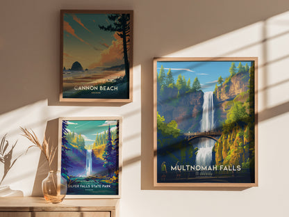 Three framed posters are displayed on a sunlit wall. They depict scenic landscapes: Cannon Beach, Silver Falls State Park, and Multnomah Falls, each featuring vibrant natural elements.