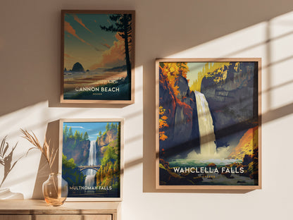 Three framed posters are displayed on a wall, depicting scenic Oregon locations: Cannon Beach, Multnomah Falls, and Wahclella Falls. Sunlight casts shadows across the art and nearby vase.