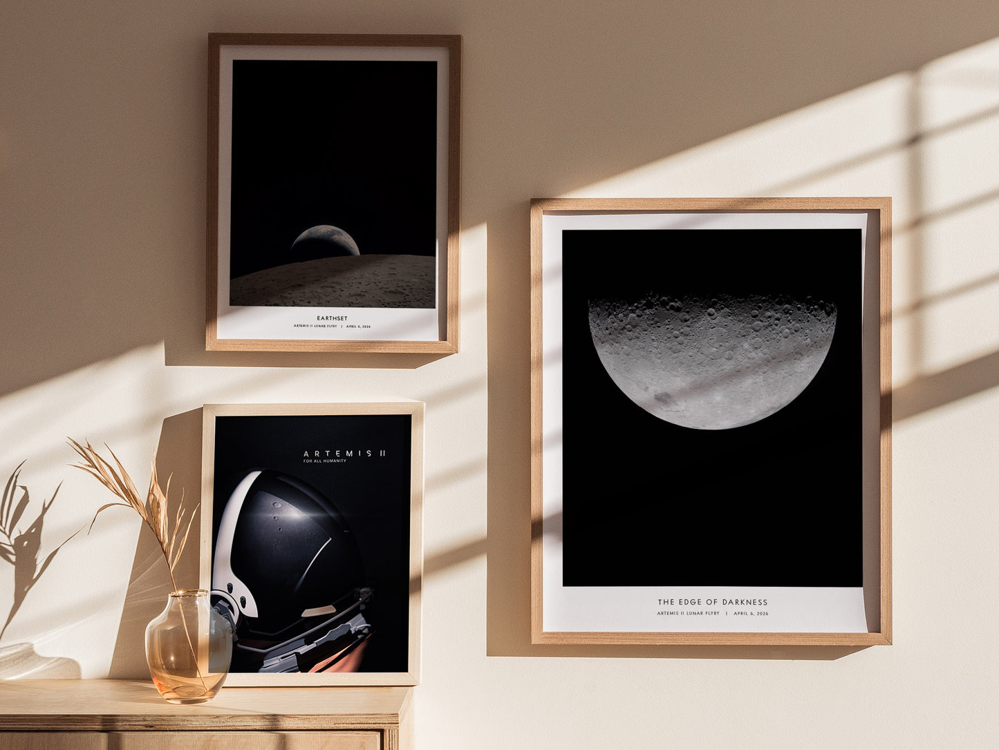 Detailed lunar surface craters in shades of gray captured in "Edge of Darkness," a NASA-inspired space art print by Swell Scenes.